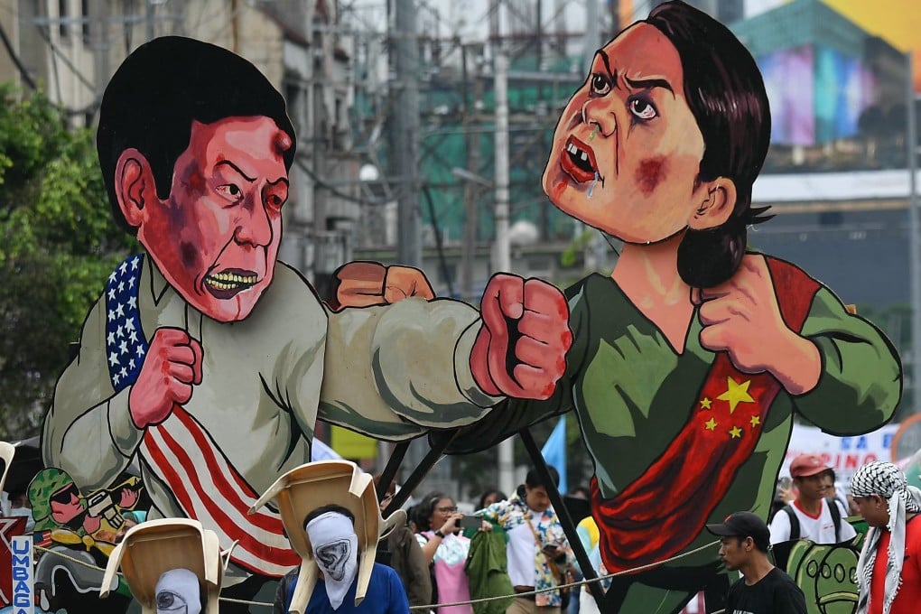 Protesters carry effigies of Philippine President Ferdinand Marcos Jnr (left) and Vice-President Sara Duterte during a demonstration in Manila last year. Photo: AFP