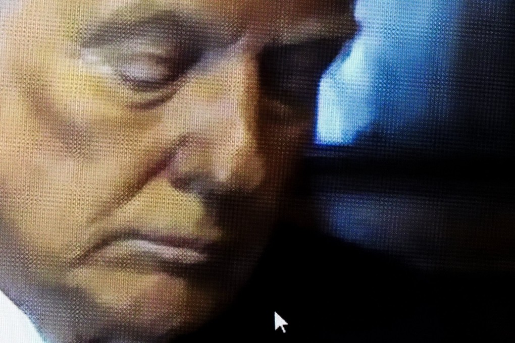 US president-elect Donald Trump appears on a screen remotely on Friday for a sentencing hearing in front of New York State Judge Juan Merchan. Photo: EPA-EFE