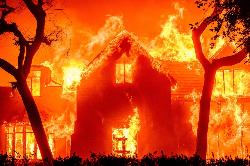 A home is engulfed in flames during the Eaton fire in the Altadena area of Los Angeles County on Wednesday. Photo: AFP