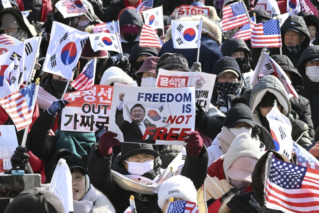 Supporters of impeached South Korean President Yoon Suk-yeol gather near his residence in Seoul on Thursday. Photo: Kyodo