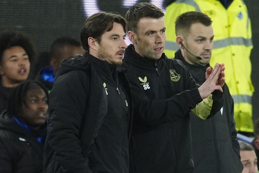 Everton caretaker managers Leighton Baines( left) and Seamus Coleman consult on the touchline. Photo: AP
