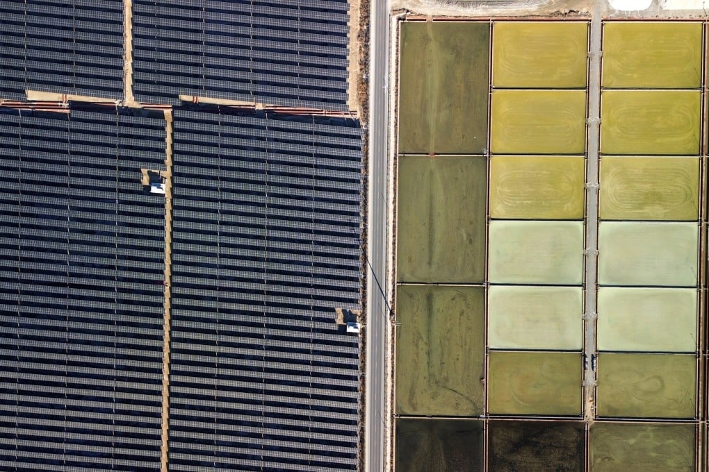 A salt-photovoltaic complementary power project and salt fields in Laizhou, Shandong province. Photo: Xinhua