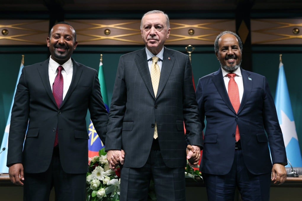 Turkish President Tayyip Erdogan (centre) poses with Somali President Hassan Sheikh Mohamud (right) and Ethiopian Prime Minister Abiy Ahmed, following a press conference at the Presidential Complex in Ankara, Turkey. Photo: dpa