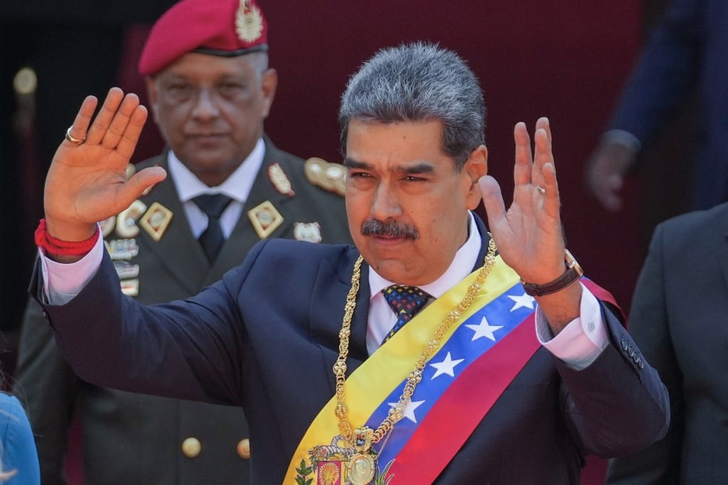 Venezuelan President Nicolas Maduro waves after being sworn in for a third term in Caracas on Friday. Photo: AP