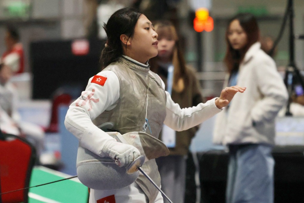 Kuan Yu-ching sustained a reoccurrence of the injury in her left knee during the preliminary rounds of the event. Photo: Mike Chan