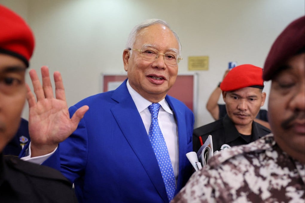 Former Malaysian Prime Minister Najib Razak waves after court proceedings in Kuala Lumpur last year. Photo: Reuters