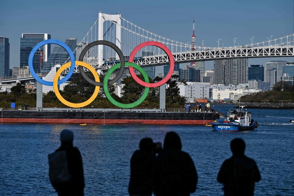 The Olympic rings being reinstalled at the waterfront in Tokyo on December 1, 2020. Morinari Watanabe has proposed hosting the Games across five cities at once. AFP