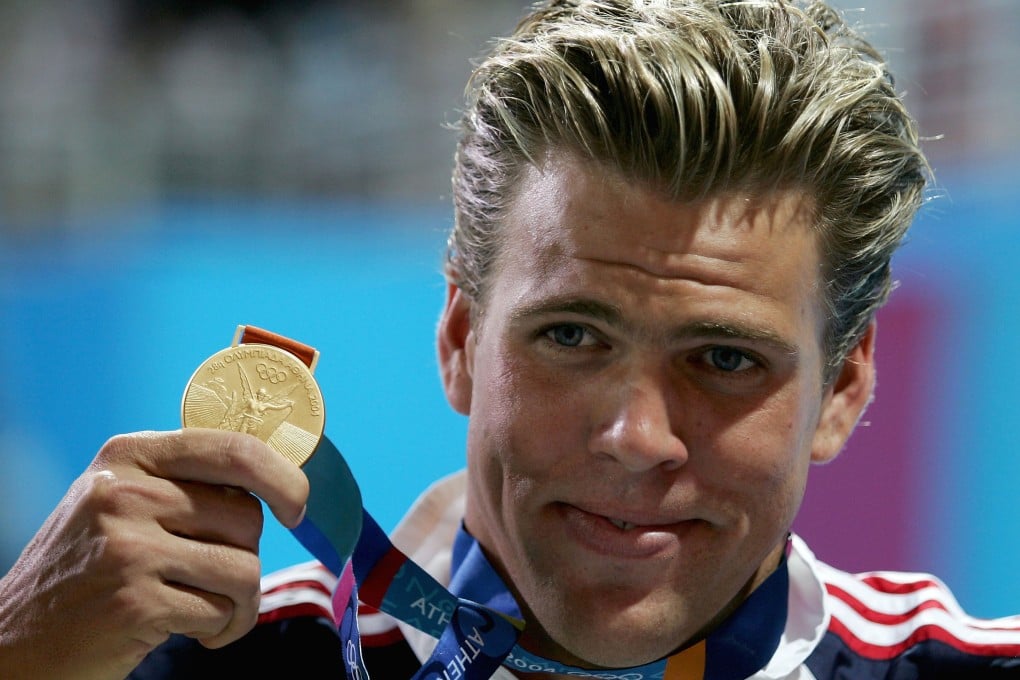 Gary Hall Jnr with his gold medal from the 50-metre freestyle at the 2004 Athens Olympics. Hall competed at the 1996 and 2000 Games as well, winning five gold, three silver and two bronze medals in all. Photo: TNS