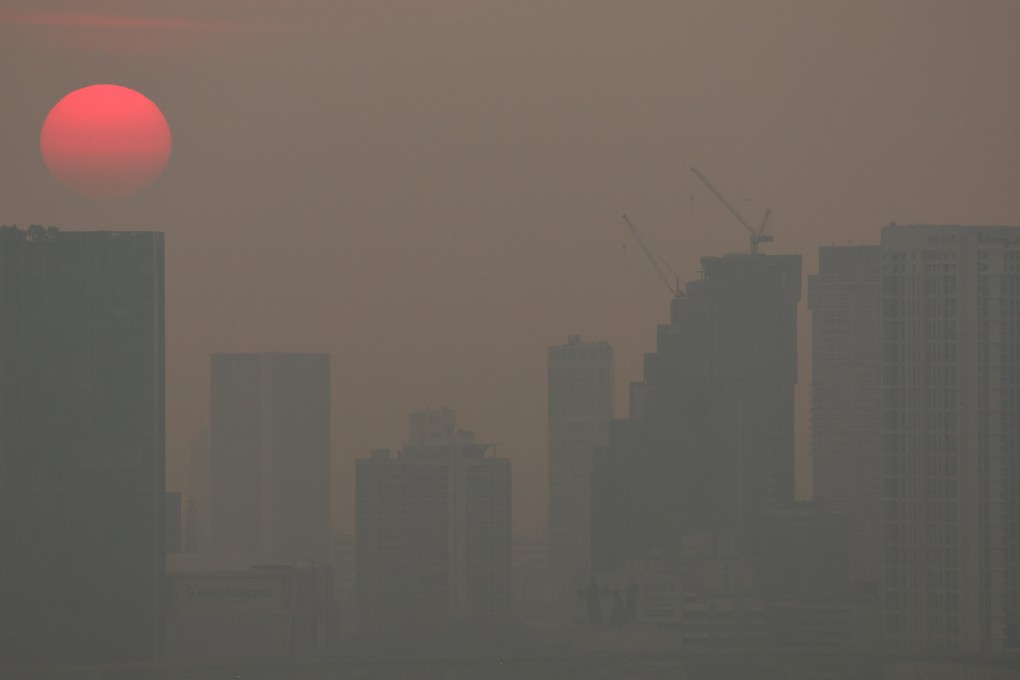 The sun rises above buildings shrouded by smog in Bangkok, Thailand, on Wednesday last week. Photo: Reuters
