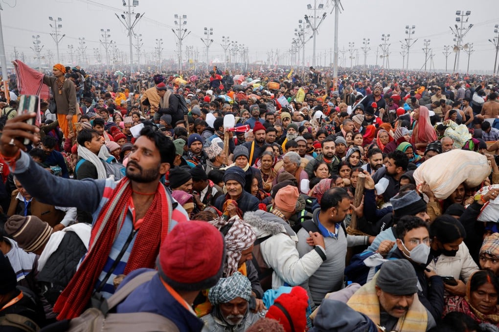 Devotees gather at the Maha Kumbh Mela in Prayagraj, India to take a holy dip in the waters at the confluence of the Ganges and Yamuna rivers on the first day of the world’s largest gathering, expected to draw 400 million Hindus. Photo: Reuters