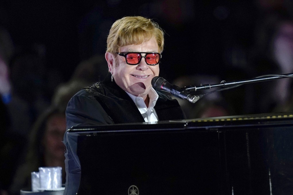 Elton John performs at the White House in Washington in 2022. A new documentary, Never Too Late, celebrates his 50-plus years on stage, and his life. Photo: AP
