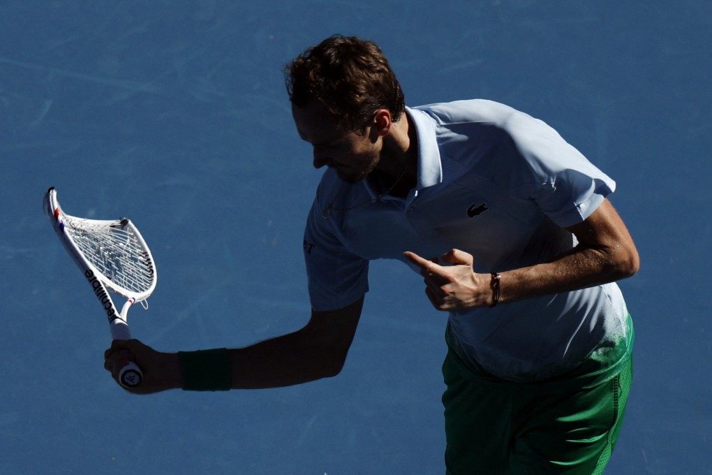 Russia’s Daniil Medvedev smashes his racquet and a net camera during his match against Thailand’s Kasidit Samrej. Photo: Reuters