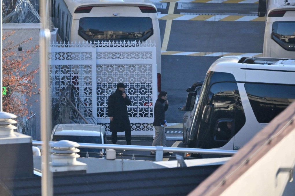 Security personnel check vehicles at the entrance gate of the presidential residence of South Korea’s impeached president Yoon Suk-yeol last week. Photo: AFP