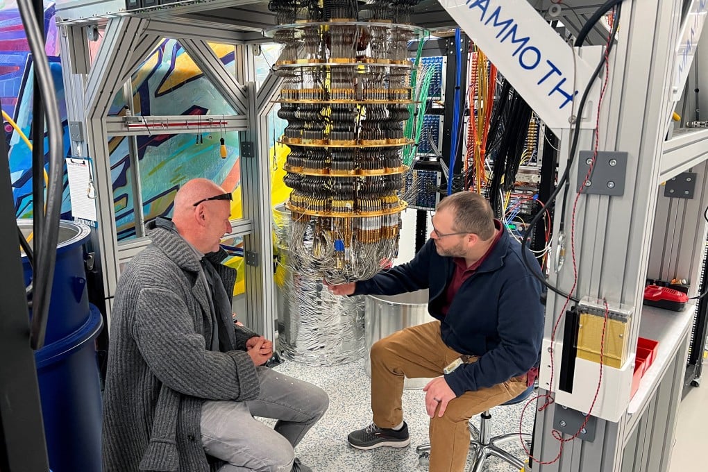 Google Quantum AI’s Hartmut Neven (left) and Anthony Megrant examine a cryostat refrigerator for cooling quantum computing chips at Google’s Quantum AI lab in Santa Barbara, California, on November 25, 2024. Photo: Reuters