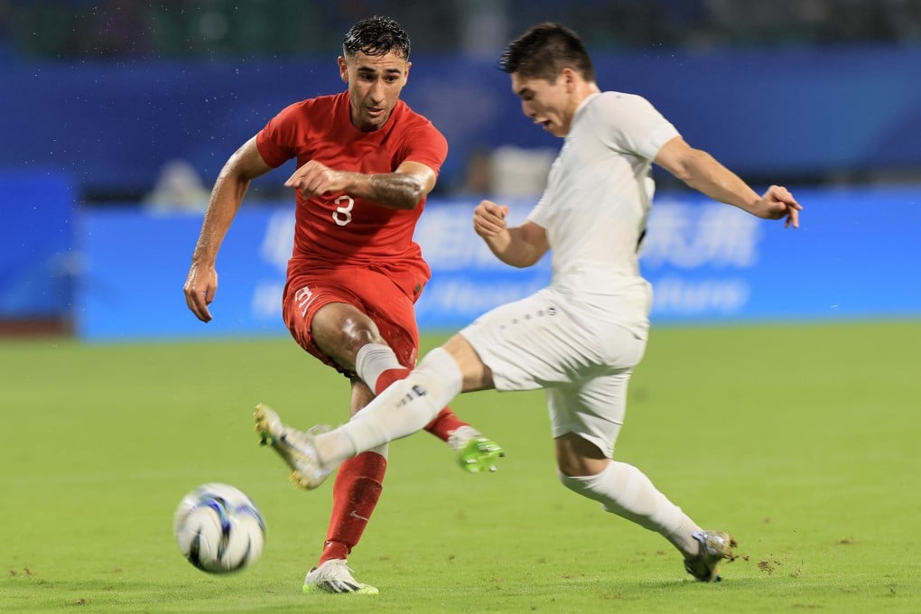Hong Kong’s Alex Jojo (left) playing against Uzbekistan at the Asian Games in 2023. Photo: Dickson Lee