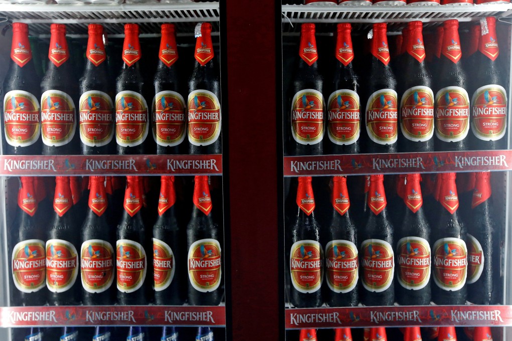 Kingfisher beer bottles are seen for sale at a liquor shop in India. Photo: Reuters