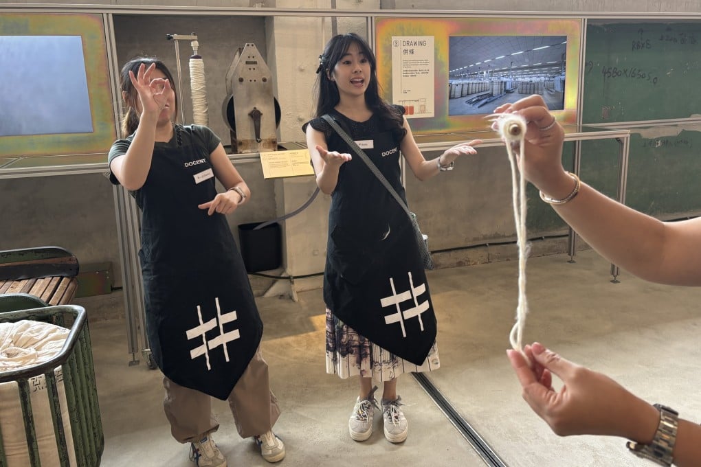 Stella Lee (left), a deaf guide and Hong Kong Sign Language teacher, and Belle Sinn, a hearing guide and language therapy student at the Chinese University of Hong Kong, give a tour at the Centre for Heritage, Arts and Textile (Chat) in Tsuen Wan, Kowloon. Photo: SCMP
