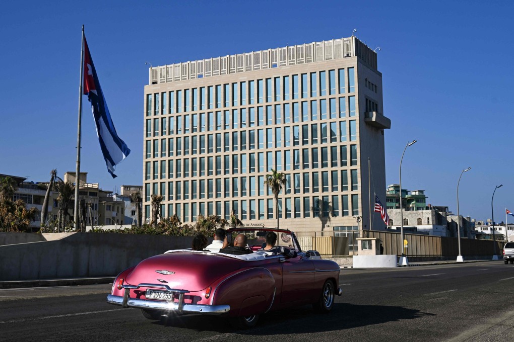 A car drives past the US Embassy in Havana. Photo: AFP