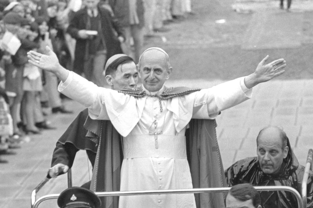Pope Paul VI waves to followers as he arrives for a mass at the Hong Kong Stadium, in 1970. Photo: SCMP Archives
