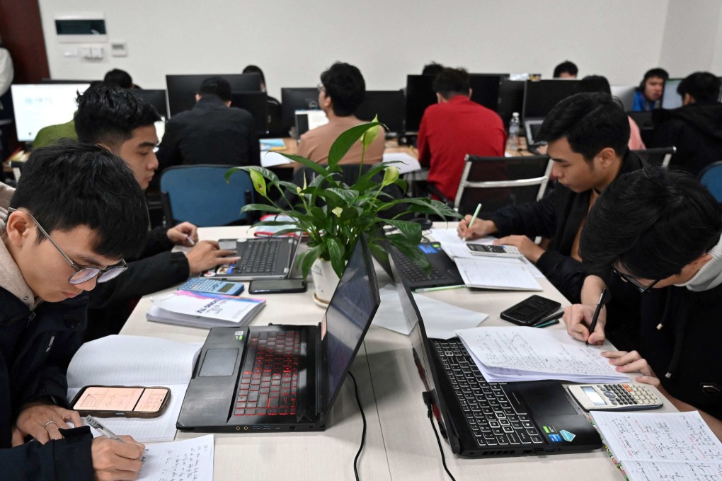 Vietnamese students work in a classroom at the Hanoi University of Science and Technology in Vietnam. Photo: AFP