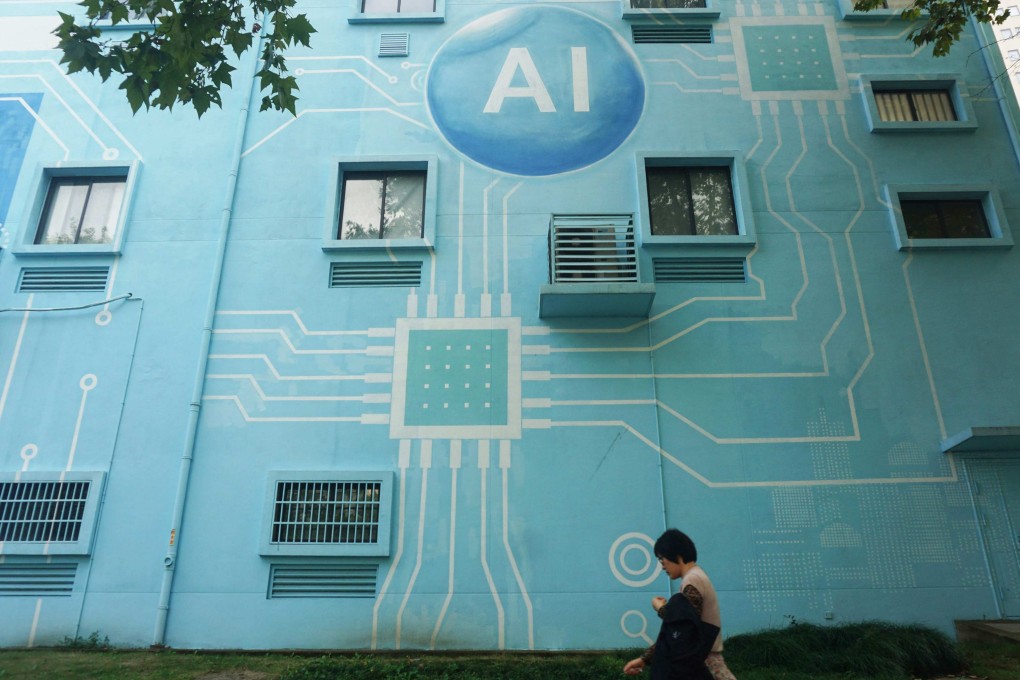 A woman walks past a building with an exterior wall painted to look like a circuit board in China’s Hangzhou, Zhejiang province. Photo: AFP