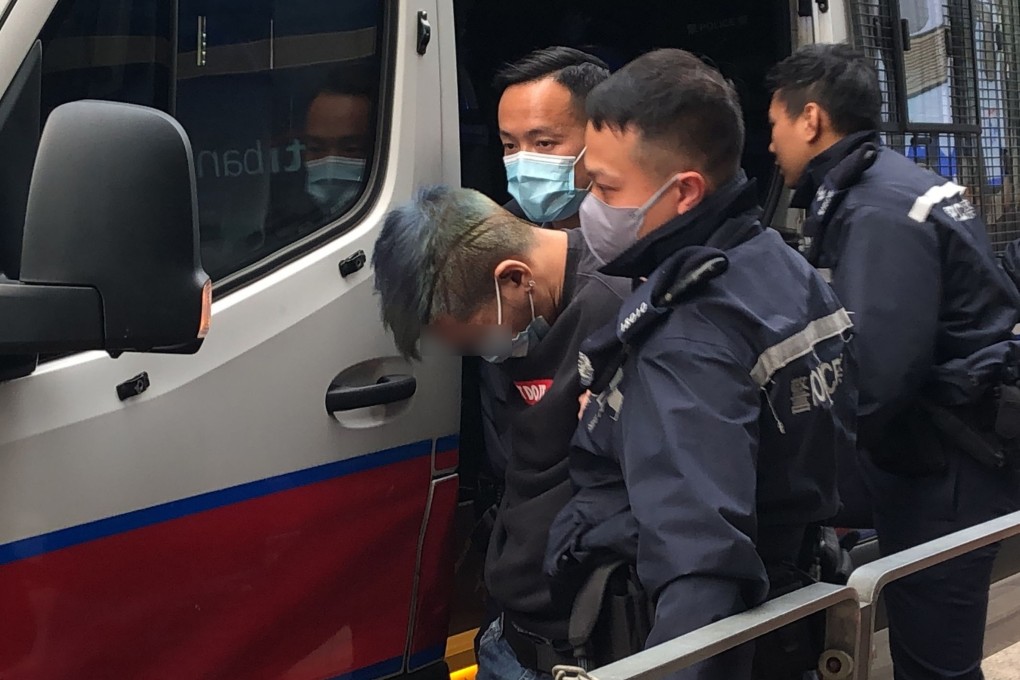 Police take away the suspect on Tuesday,  Photo: Handout