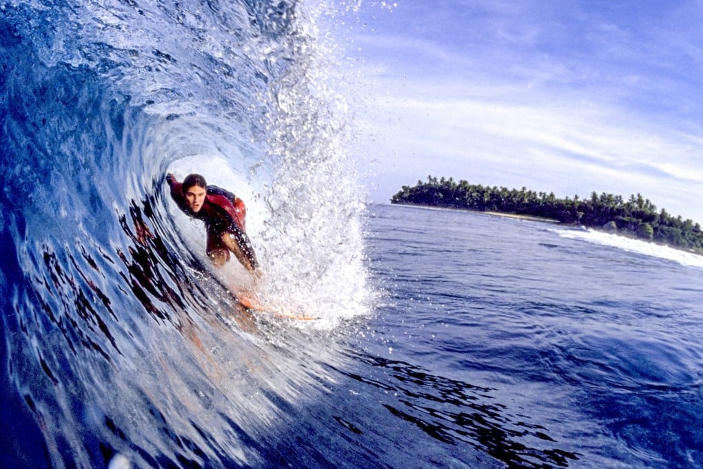 Seasoned surfers flock to the famous Cloud 9 surf spot on Siargao Island in the Philippines, one of our eight top Asian surfing destinations to ride the waves. Photo: Getty Images