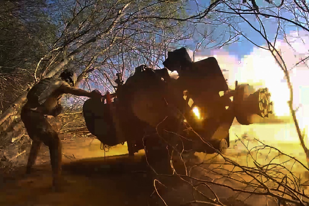 A Russian soldier fires a gun toward a Ukrainian position in the Kursk region, in an image released in October. Photo: Russian Defence Ministry Press Service via AP