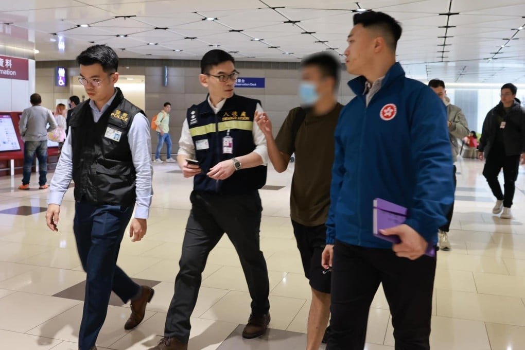 The victim is received by members of the Security Bureau, police and the Immigration Department at Hong Kong airport. Photo: Security Bureau
