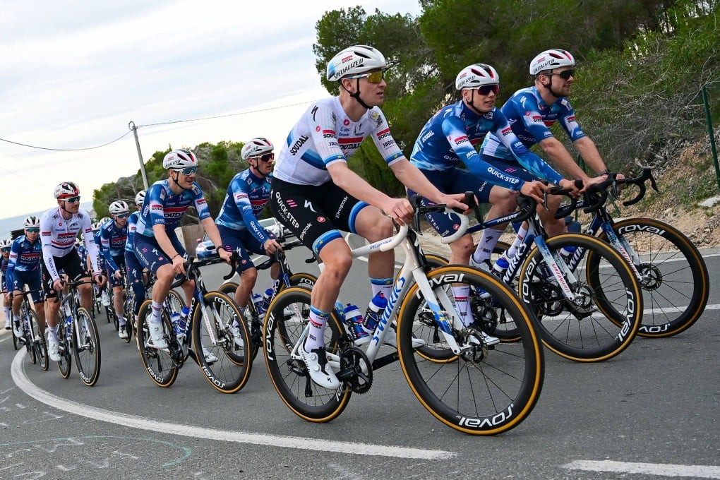 Belgian cyclist Tim Merlier (centre) of team Soudal Quick-Step rides with teammates during a training session in Calpe, near Alicante, eastern Spain, on January 9, 2025. Photo: AFP