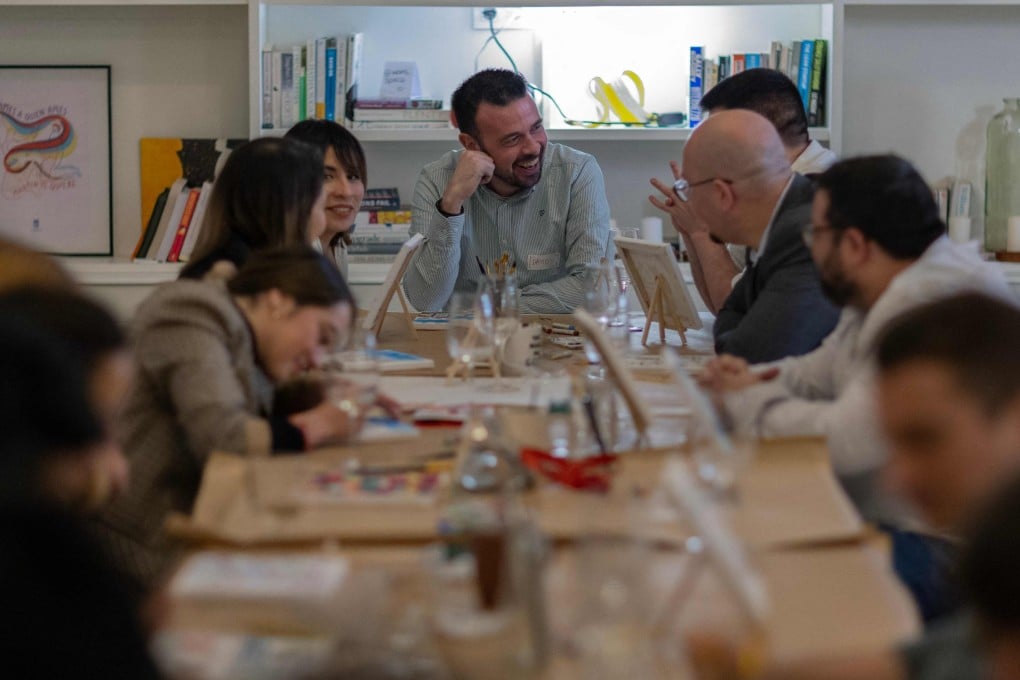 Young single people at a “slow dating club” gathering in Madrid, Spain The face-to-face matchmaking scheme is part of a growing trend of ditching dating apps for face-to-face encounters. Photo: AFP