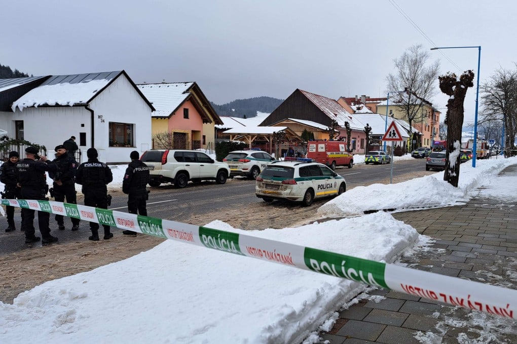 Police are seen outside a grammar school in the town of Spisska Stara Ves, eastern Slovakia where a student killed at least two people and seriously wounded another in a knife attack. Photo: AFP