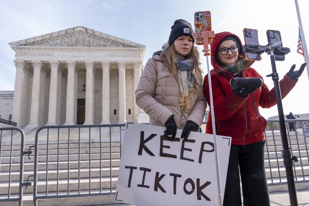 TikTok fans film themselves outside the US Supreme Court. Photo: AP