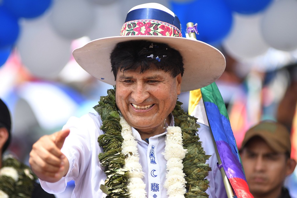 Former Bolivian president Evo Morales greets supporters during an event at the Chimore stadium in December. Photo: EPA-EFE