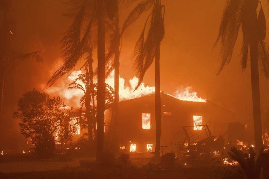 A home burns in the Eaton Fire in Altadena, Los Angeles County, California, on January 8, 2025, as fires continue to ravage parts of the city. Large swathes of Altadena have since been destroyed. Photo: AP