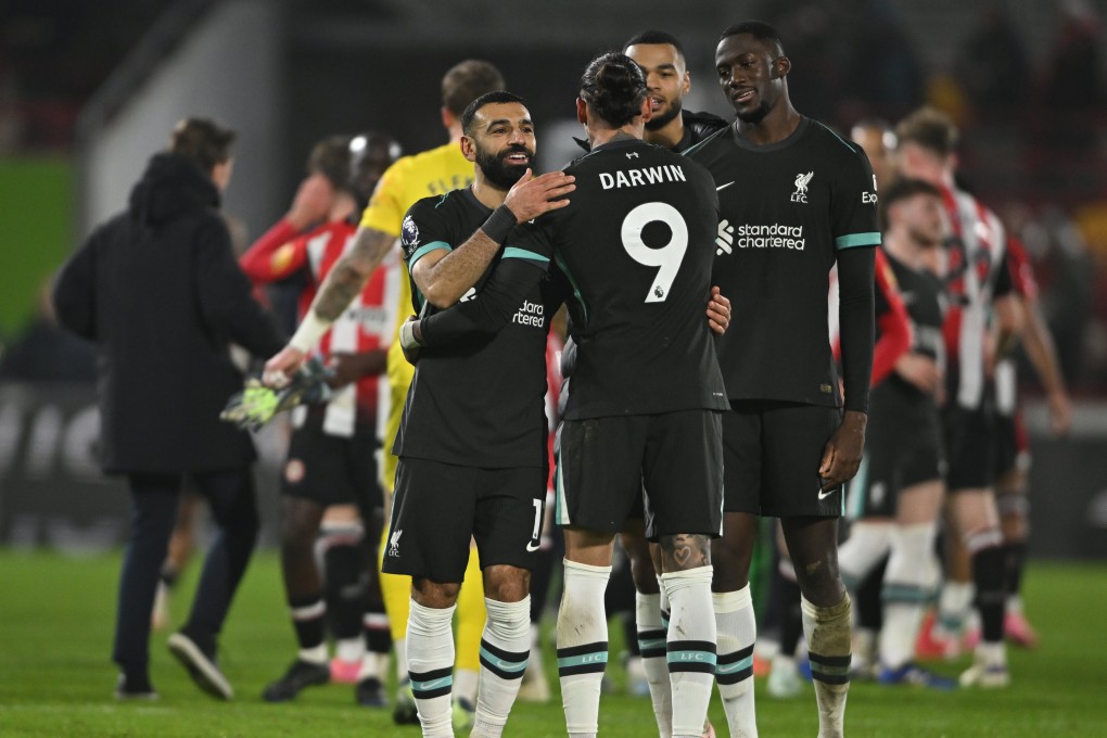 Darwin Nunez celebrates with his Liverpool teammates after his late double earned his side a dramatic victory over Brentford. Photo: EPA
