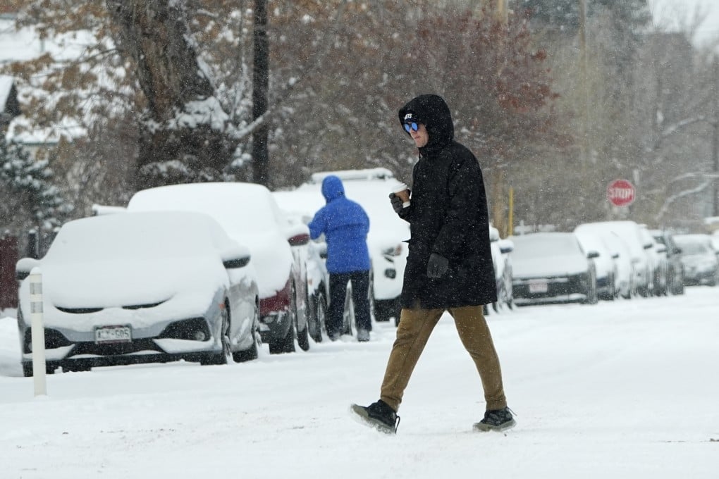 A snowy scene in Denver, Colorado. Tens of millions along the US east coast are bracing snow followed by dangerously cold temperatures. Photo: AP