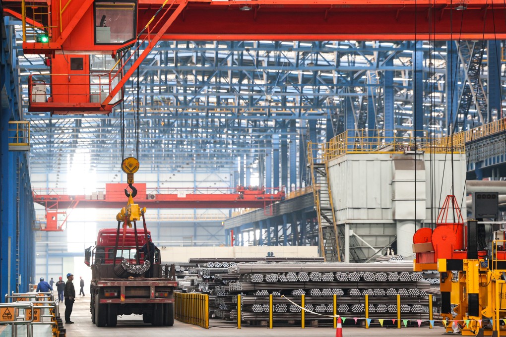 Workers at HBIS Group Shijiazhuang Iron and Steel hoist steel for transport in northern Hebei province in January 2025. Photo: Xinhua
