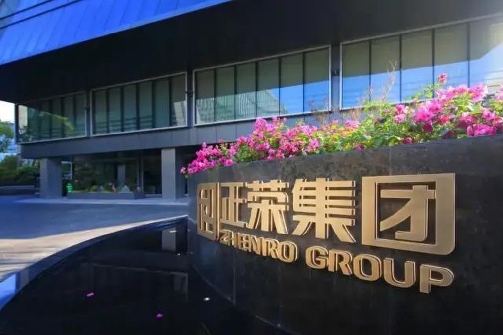 A Zhenro Group logo is shown outside an office building. Photo: Weibo
