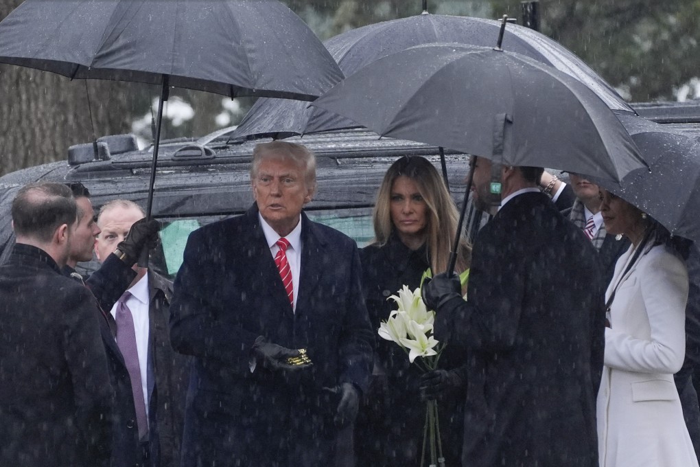 US president-elect Donald Trump and his wife Melania visit the Arlington National Cemetery in Virginia on Sunday. Photo: AP Photo