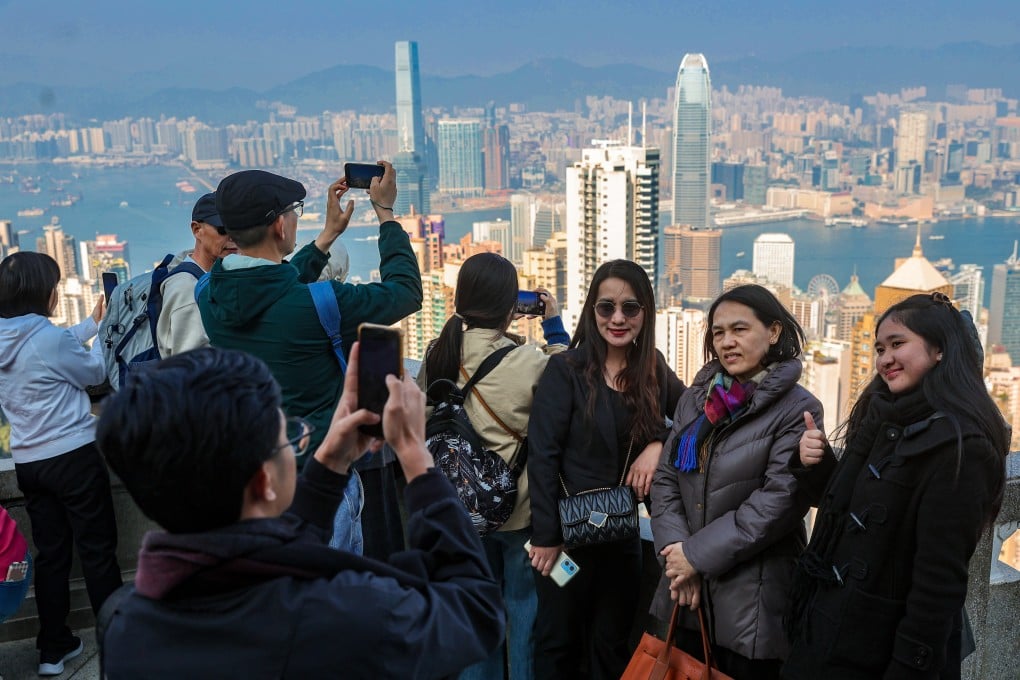 Real-time information about popular photo spots such as The Peak would be helpful for tourists, a union leader said. Photo: Edmond So