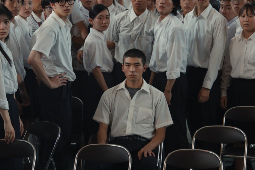 Yukito Hidaka (front) in a still from Happyend (category IIA; Japanese), directed by Neo Sora. Hayato Kurihara co-stars.
