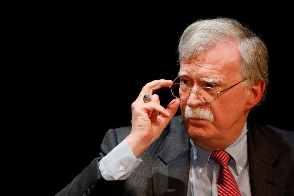 Former US national security adviser John Bolton adjusts his glasses during his lecture at Duke University in Durham, North Carolina, in February 2020. Photo: Reuters