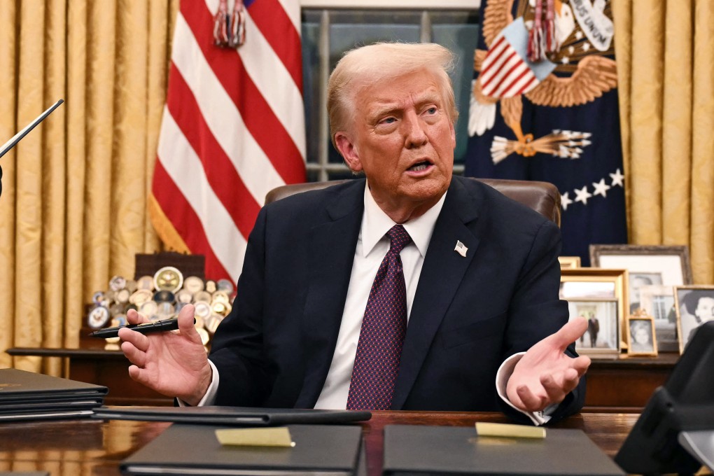 US President Donald Trump speaks to journalists about TikTok as he signs executive orders in the Oval Office of the White House in Washington on Monday. Photo: AFP/Getty Images/TNS