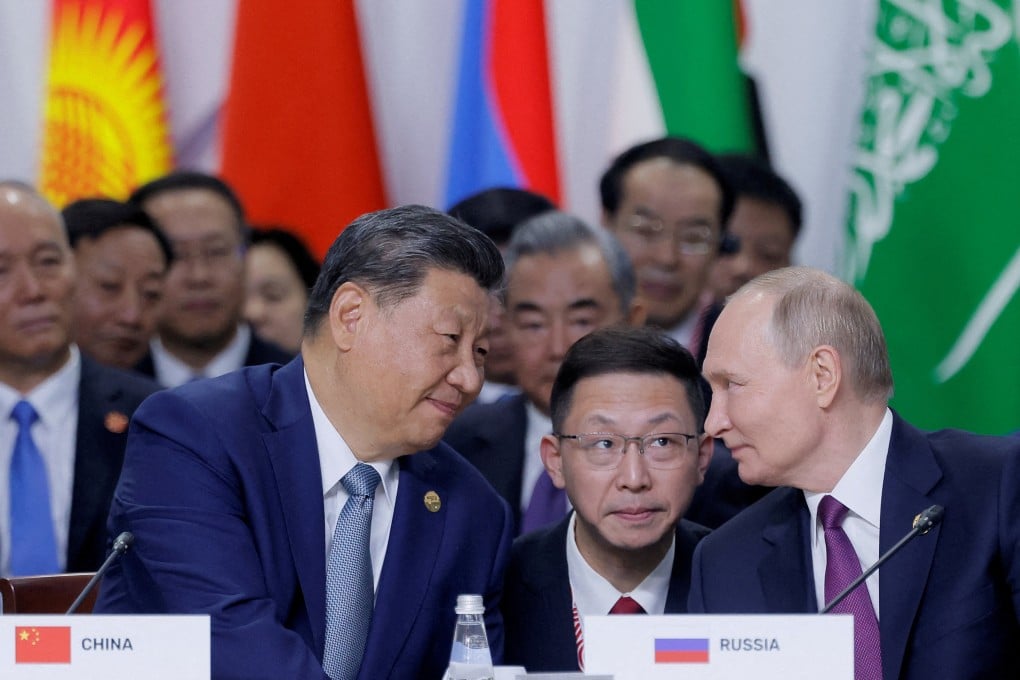 Chinese President Xi Jinping and Russian President Vladimir Putin chat at the Brics summit in Kazan, Russia, on October 24. The two countries are leading the way in collaboration from AI to moon exploration. Photo: Reuters