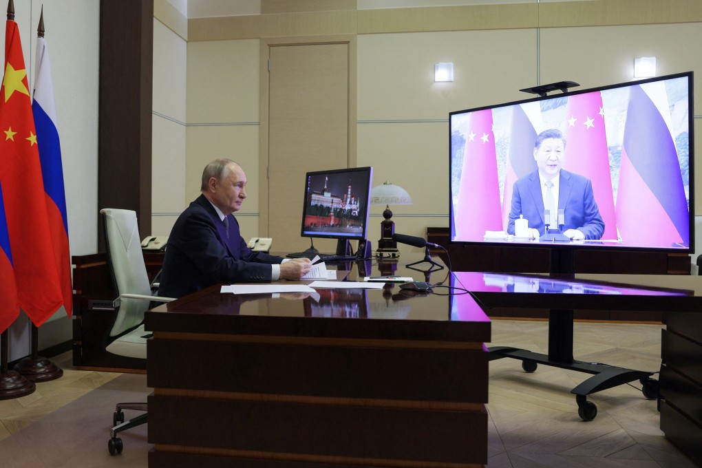 Russian President Vladimir Putin holds a videocall with Chinese President Xi Jinping on Tuesday. Photo: AFP/Getty Images/TNS