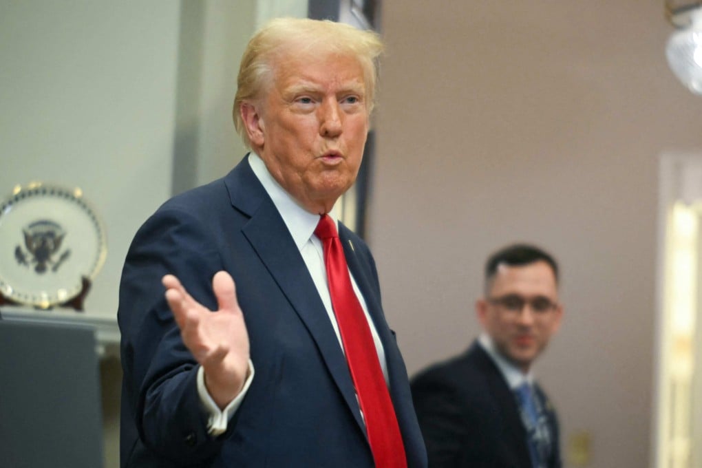 US President Donald Trump gestures as he leaves after speaking in the Roosevelt Room at the White House on Tuesday. Photo: AFP