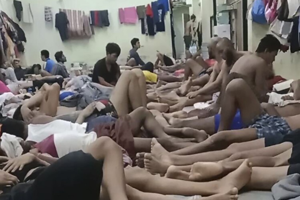 Uygur detainees who say they are facing deportation to China sit in an immigration detention centre in Bangkok in February last year. Photo: Handout via AP