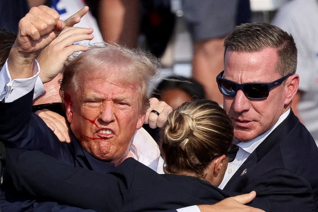 Sean Curran, right, was part of Donald Trump’s security detail. Photo: Reuters