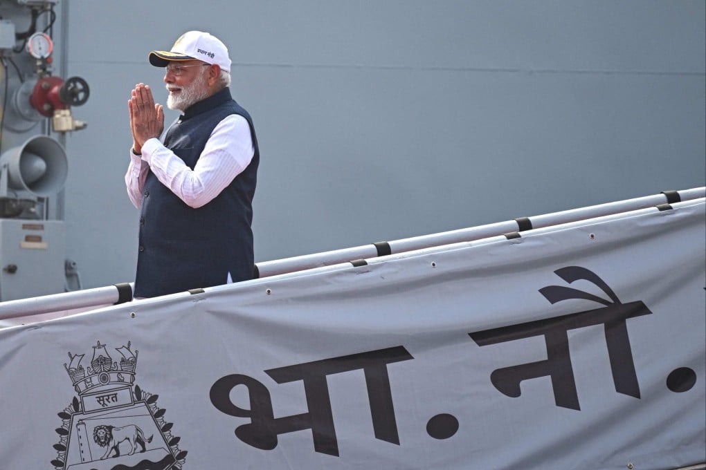 India’s Prime Minister Narendra Modi gestures during a commissioning ceremony of the Indian Navy’s INS Surat, INS Nilgiri and INS Vaghsheer ships in Mumbai on January 15. Photo: AFP